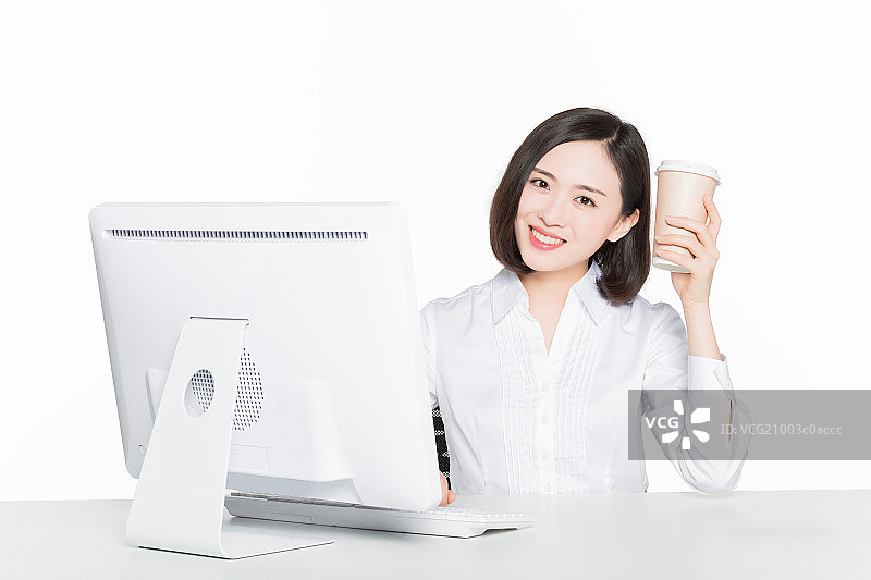 白领女性单手拿纸杯图片素材