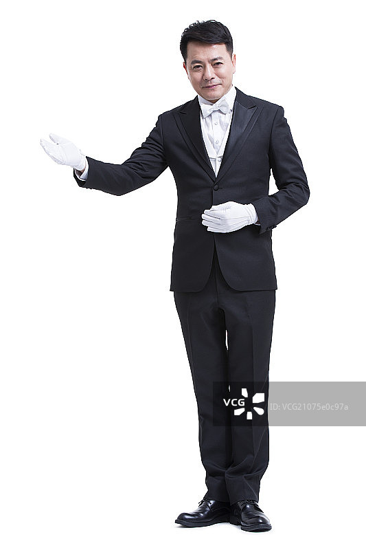 侍者做邀请手势图片素材