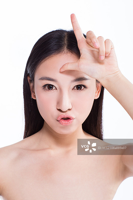 年轻女性表情特写图片素材