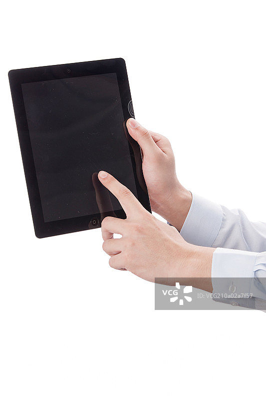 男人的手拿着平板电脑图片素材
