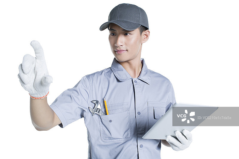 修理工拿着平板电脑图片素材