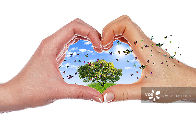 手与彩色蝴蝶、草地和环境标志拼贴图片素材