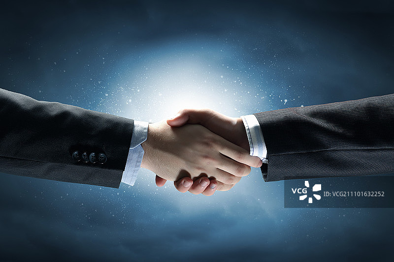 商人握手达成交易特写图片素材