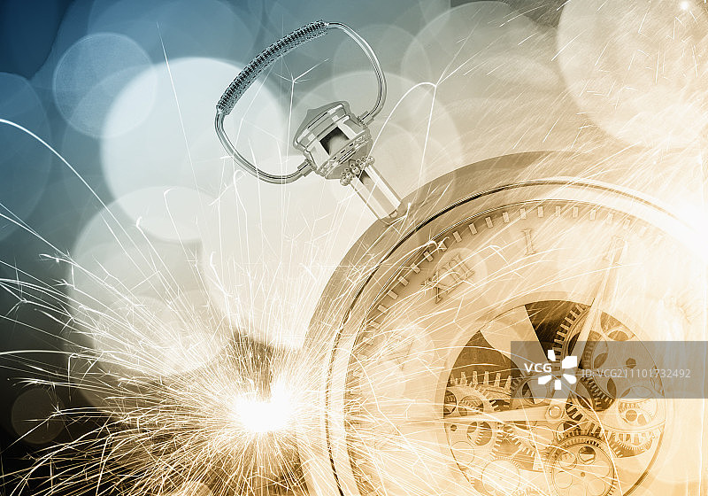 怀表概念图：散景光与烟花图片素材