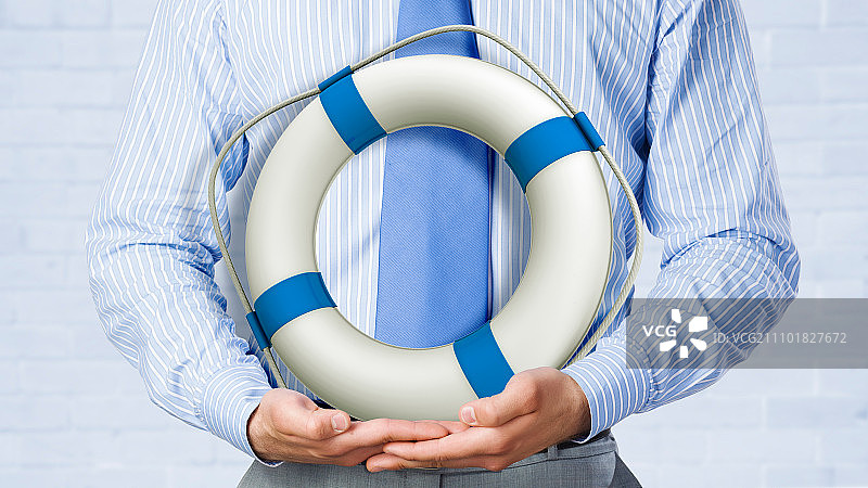 人寿保险：手持救生圈的商人图片素材