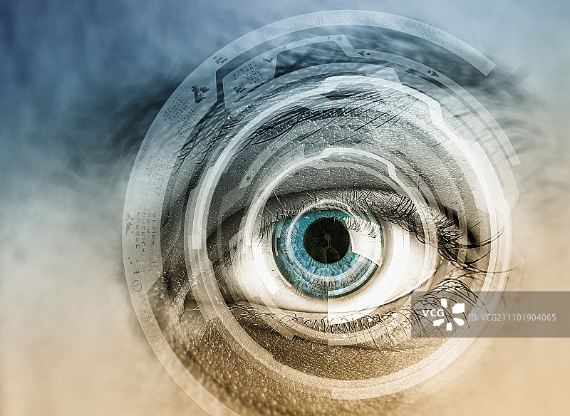 眼睛扫描。数字技术背景上的人眼特写图片素材