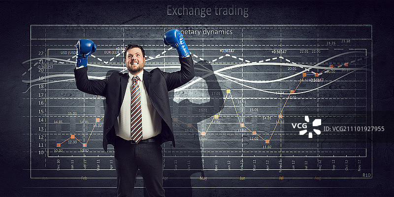 为销售额奋斗的年轻商人图片素材