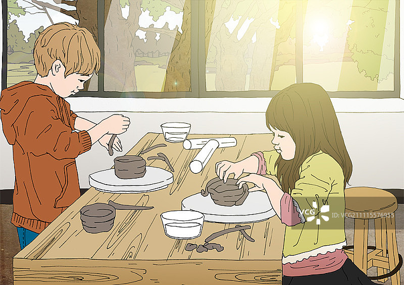 男孩和女孩一起制作陶器图片素材