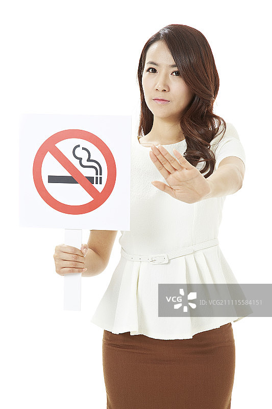 女人手持禁止吸烟标志图片素材