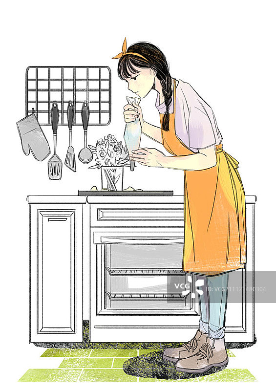 系着围裙烘焙并拿着裱花袋的女孩图片素材
