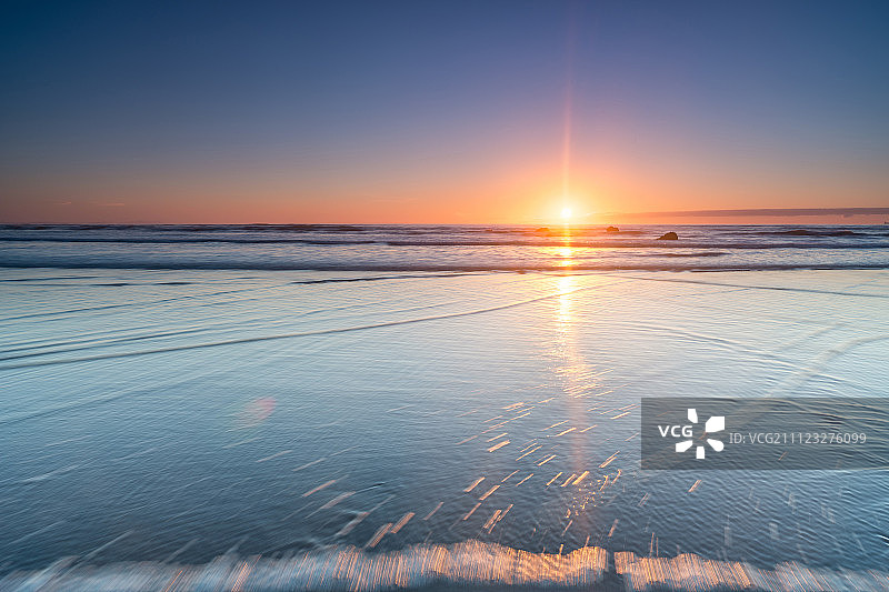 新西兰南岛基督城海滩日出图片素材