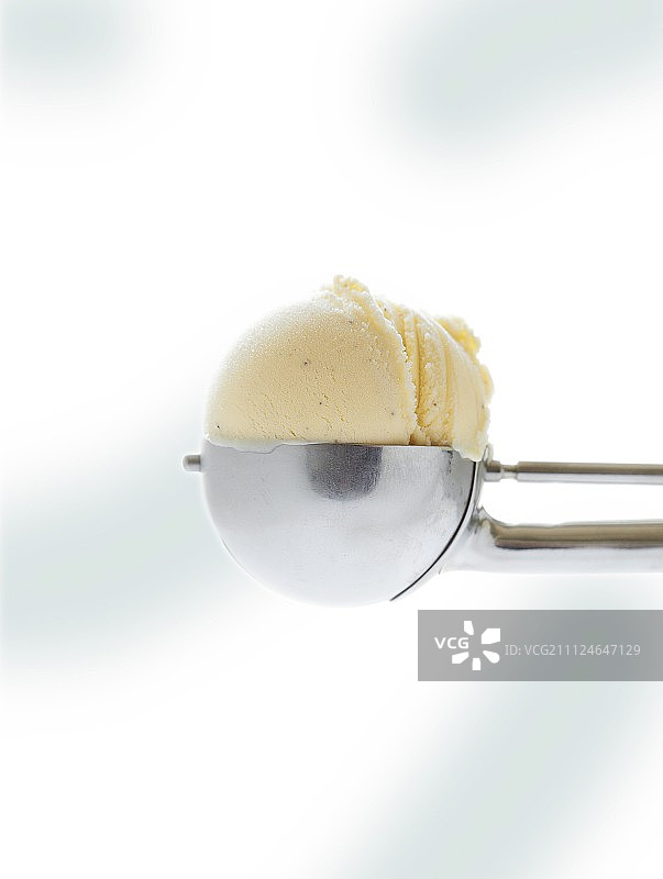 香草冰淇淋勺特写图片素材