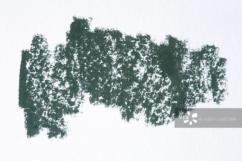 白色背景上的绿色闪光眼线特写图片素材