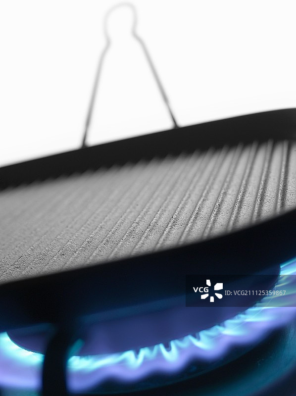 燃气灶上的烤锅图片素材