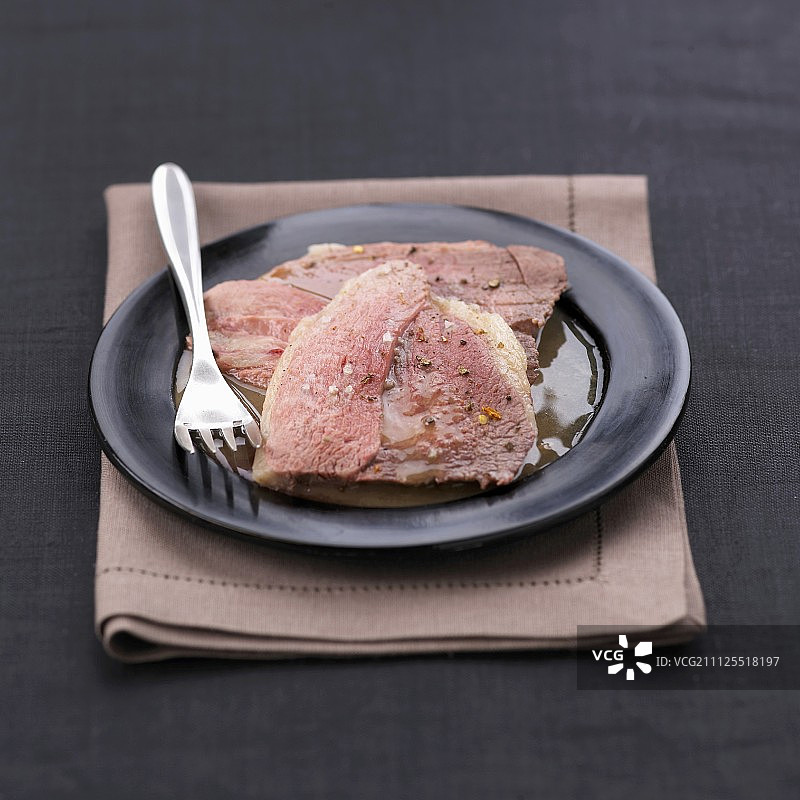 苏玳酒蒸羊腿图片素材