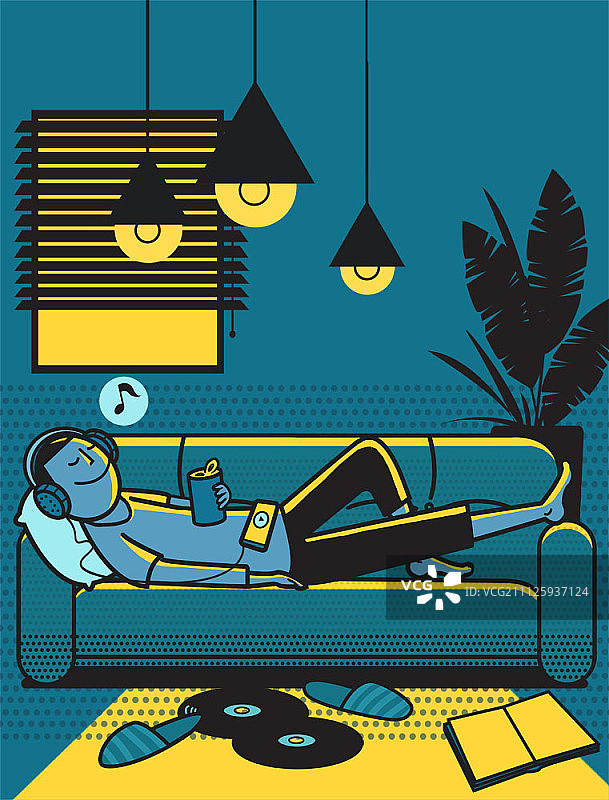 晚上躺在沙发上戴耳机的男人图片素材