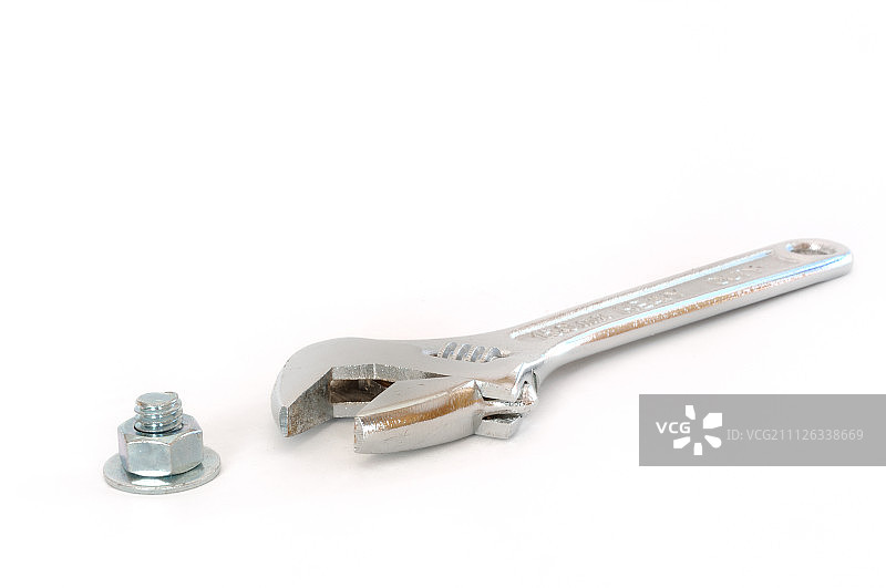 带螺栓、螺母和垫圈的可调节扳手图片素材