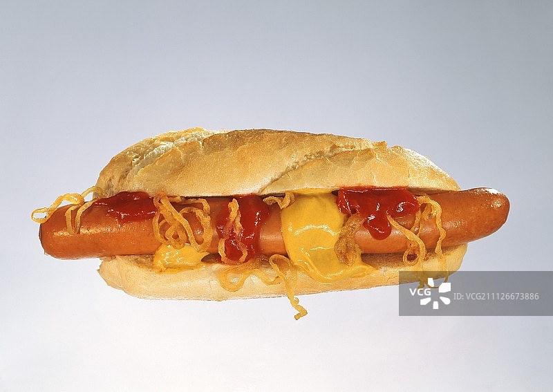 芥末番茄酱洋葱圈热狗图片素材