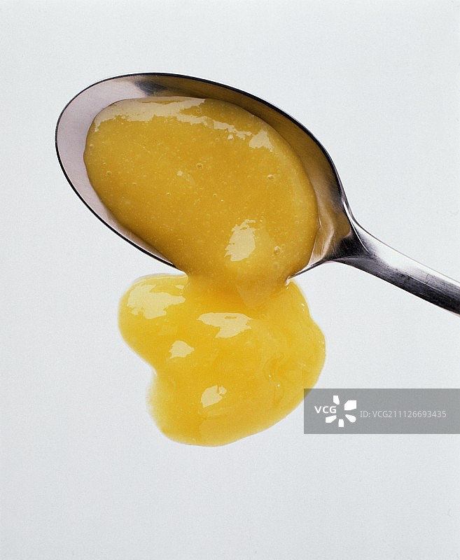 勺子上的芒果酱图片素材