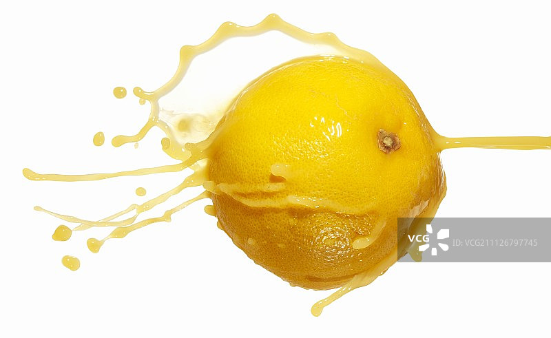 西柚与飞溅的果汁图片素材