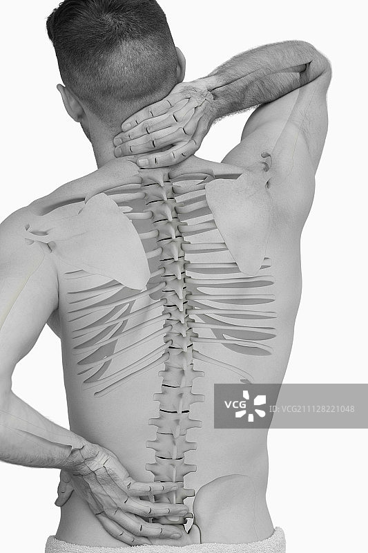 背痛男子脊柱的数字合成图图片素材