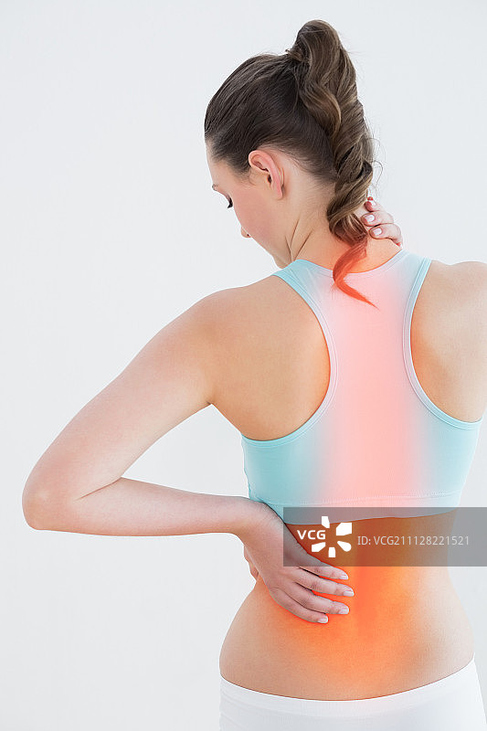 白色背景下背痛的女子背影图片素材