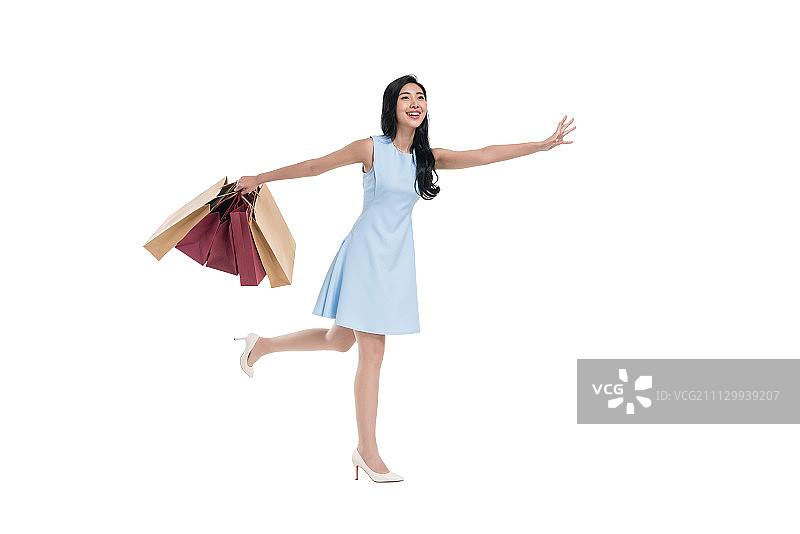 漂亮的年轻女人购物图片素材