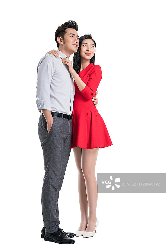 休闲装年轻情侣相互拥抱图片素材