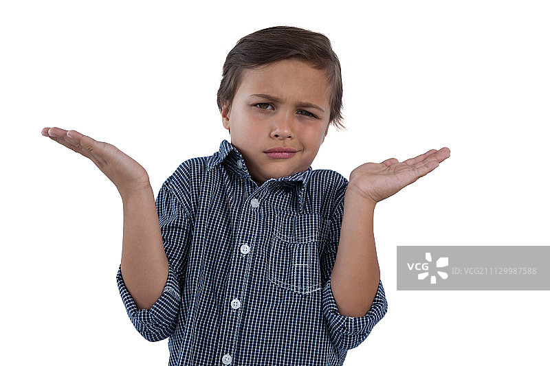 耸肩皱眉的男孩图片素材