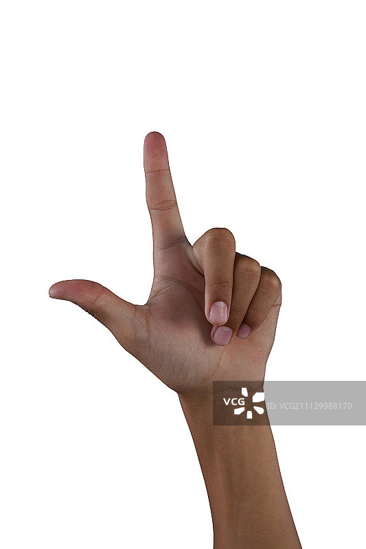 女孩指着白色背景的特写镜头图片素材