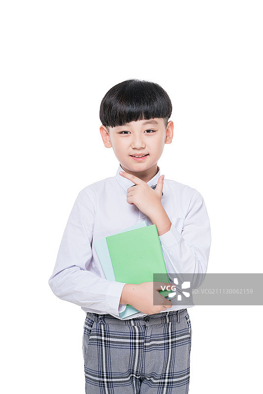 快乐的小学生手拿课本图片素材