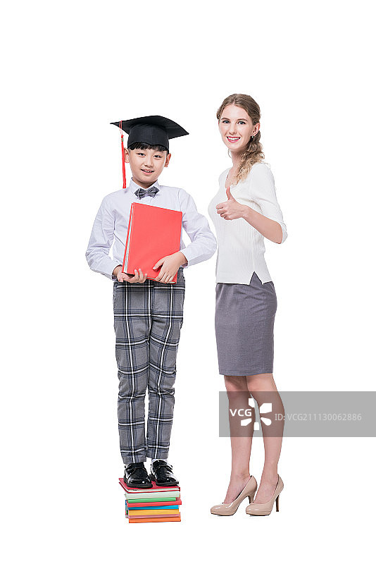 毕业的小学生和女外教图片素材