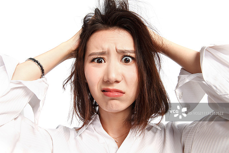 面部表情痛苦的青年女人图片素材