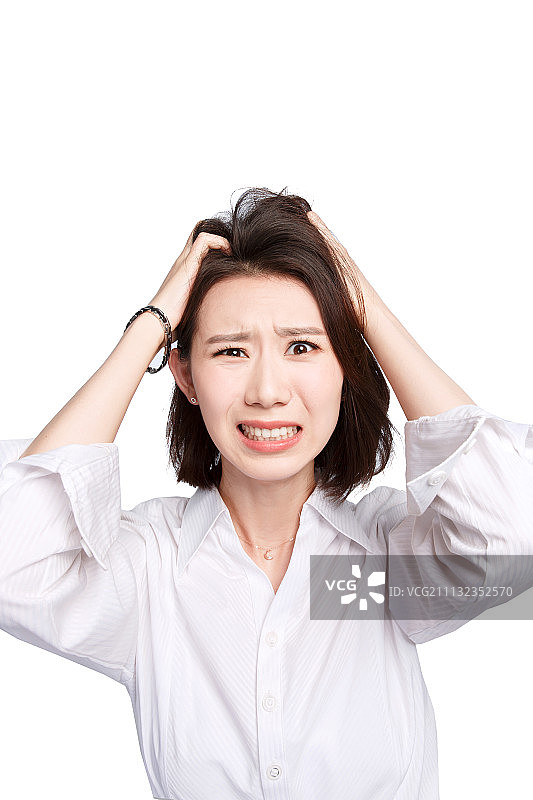 面部表情痛苦的青年女人图片素材