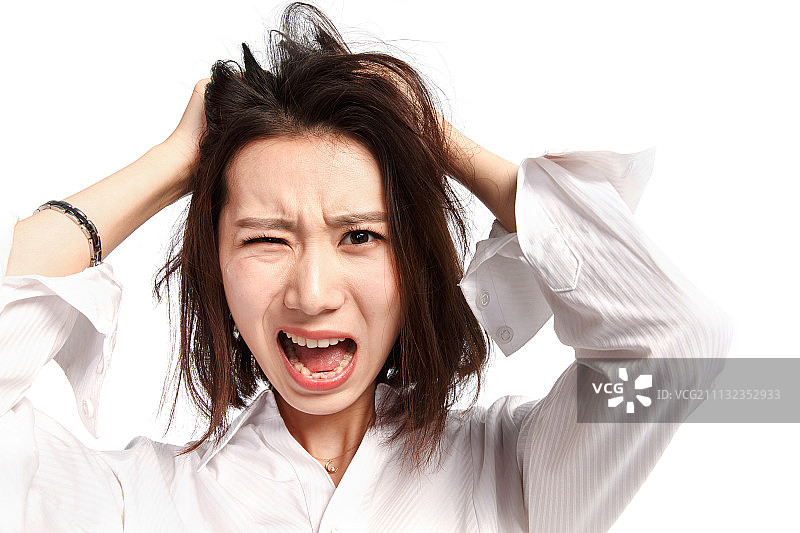 面部表情痛苦的青年女人图片素材