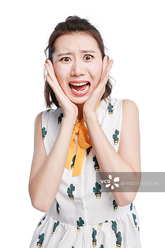 面部表情震惊的青年女人图片素材