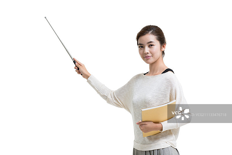 年轻女教师手持教棒授课图片素材