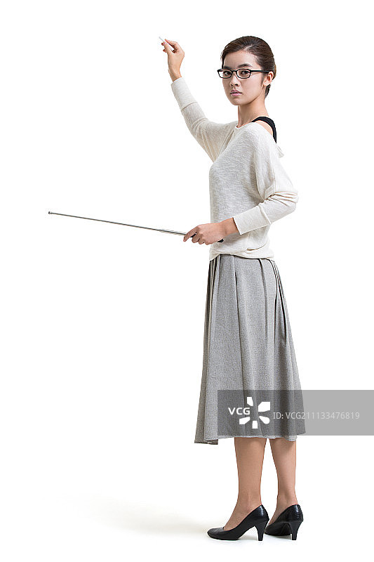 年轻女教师手持教棒授课图片素材