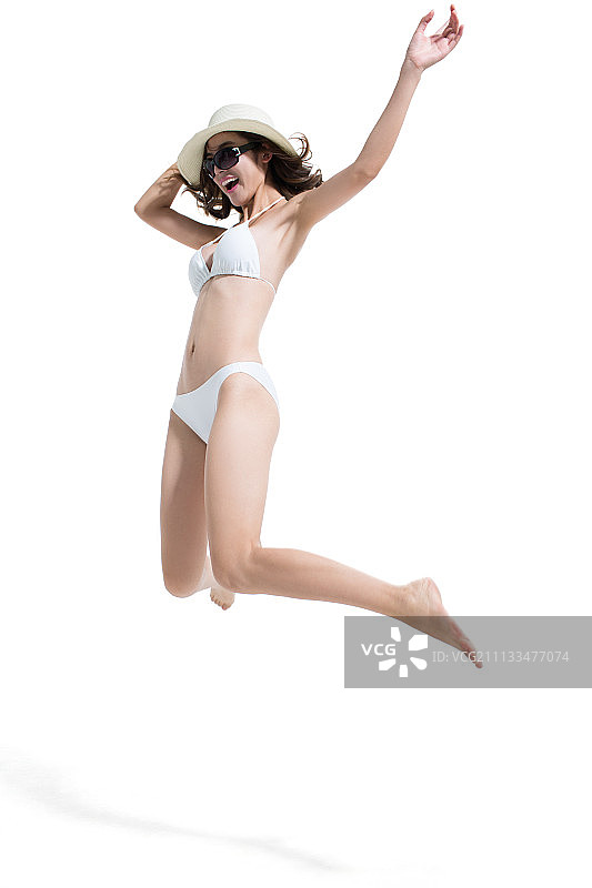 穿着比基尼的美女在跳跃图片素材