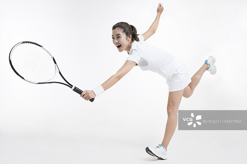 青年女子打网球图片素材