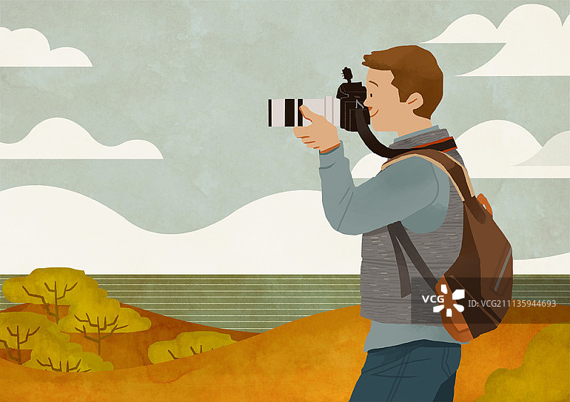 男人拿着相机拍摄风景图片素材