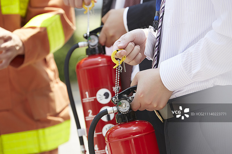 协会成员，消防员，灭火器图片素材