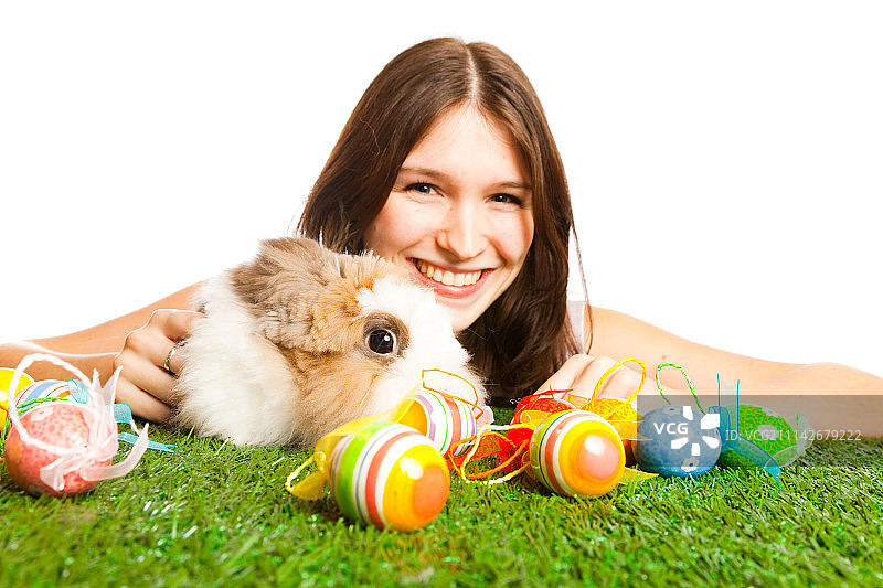 拿着彩蛋的复活节兔子图片素材