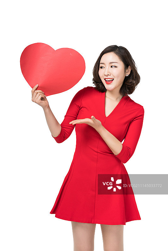 身穿红色连衣裙的年轻女子图片素材