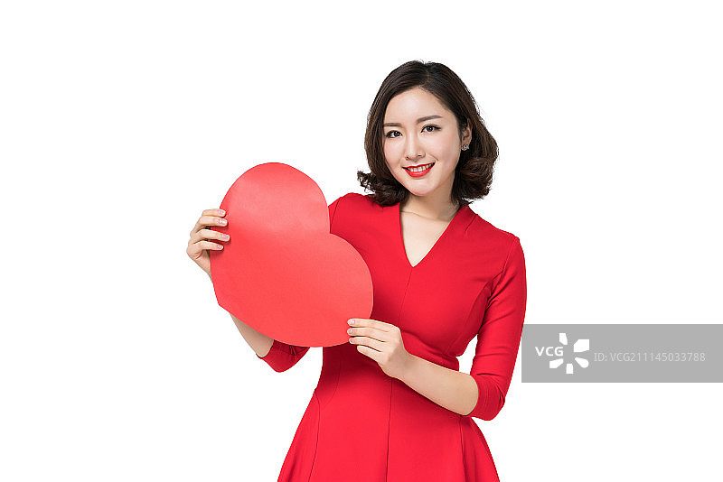 身穿红色连衣裙的年轻女子图片素材