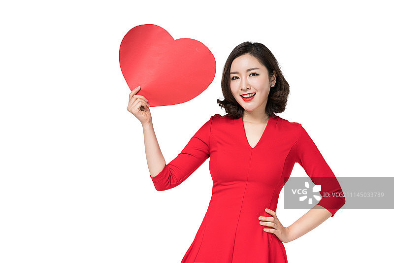 身穿红色连衣裙的年轻女子图片素材