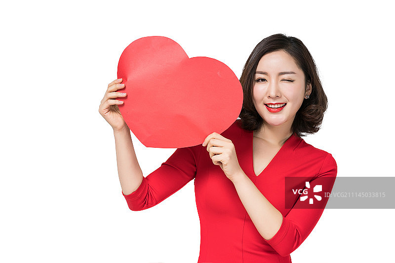 身穿红色连衣裙的年轻女子图片素材