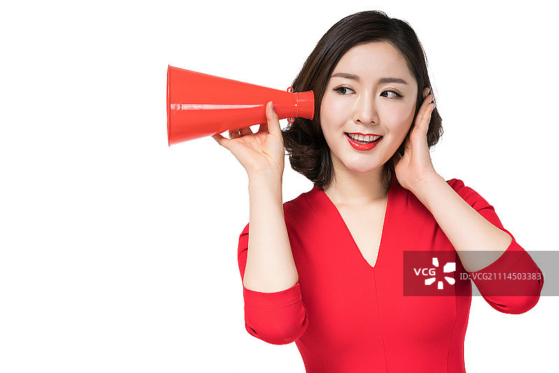 身穿红色连衣裙的年轻女子图片素材