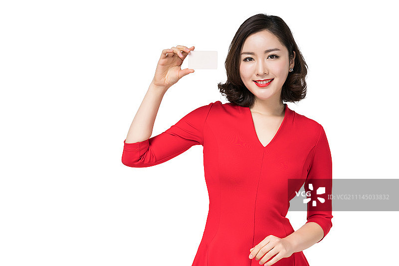 身穿红色连衣裙的年轻女子图片素材