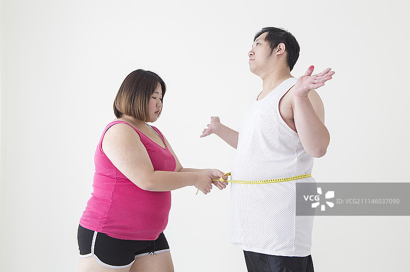 女性,男性,肥胖,测量,腰围图片素材